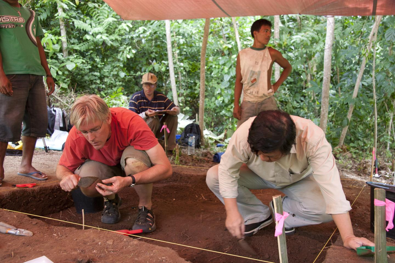 Archaeologists working at the Pulau Ay site.